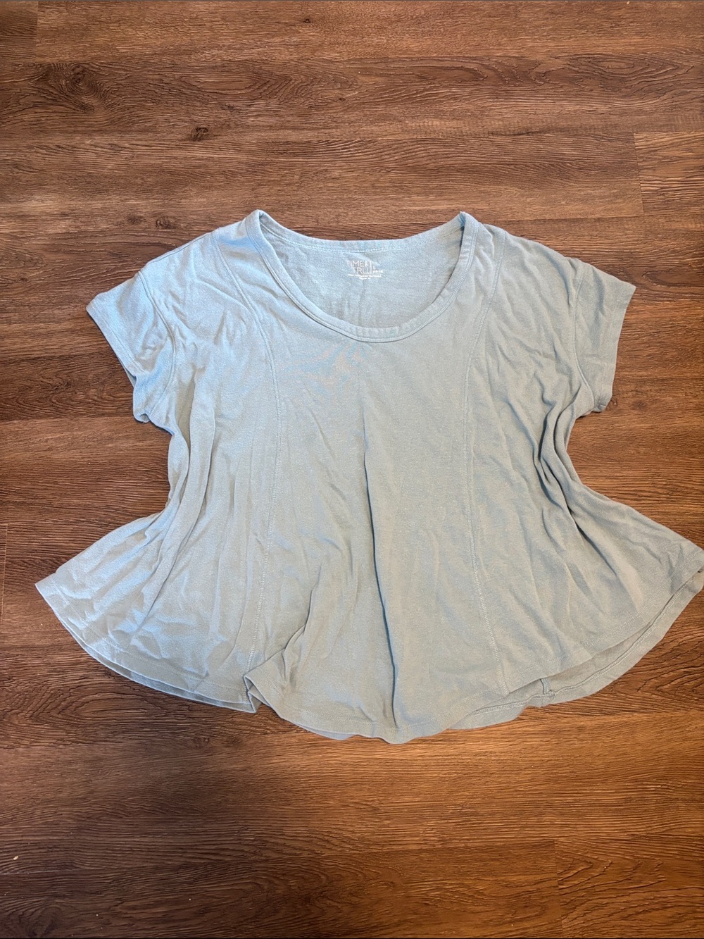 women’s blue flowy time and tru top
